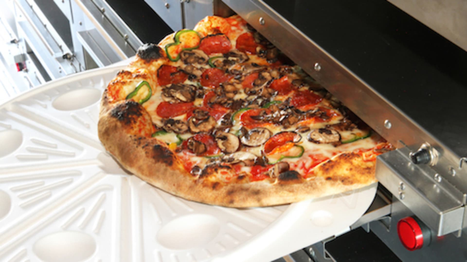 This Robot Cooks Your Pizza En Route To Your House