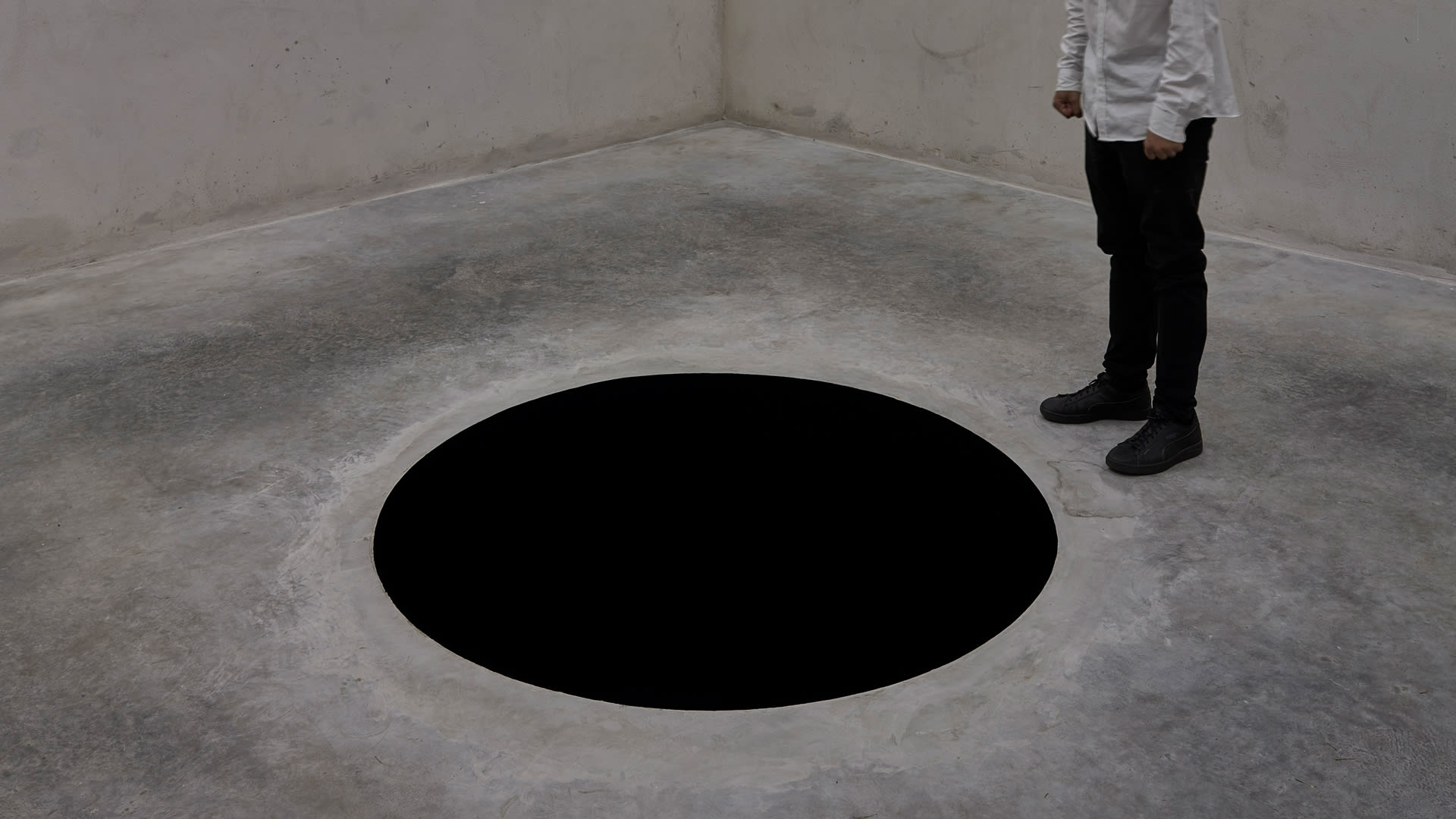 Someone fell into artist Anish Kapoor’s bottomless pit sculpture