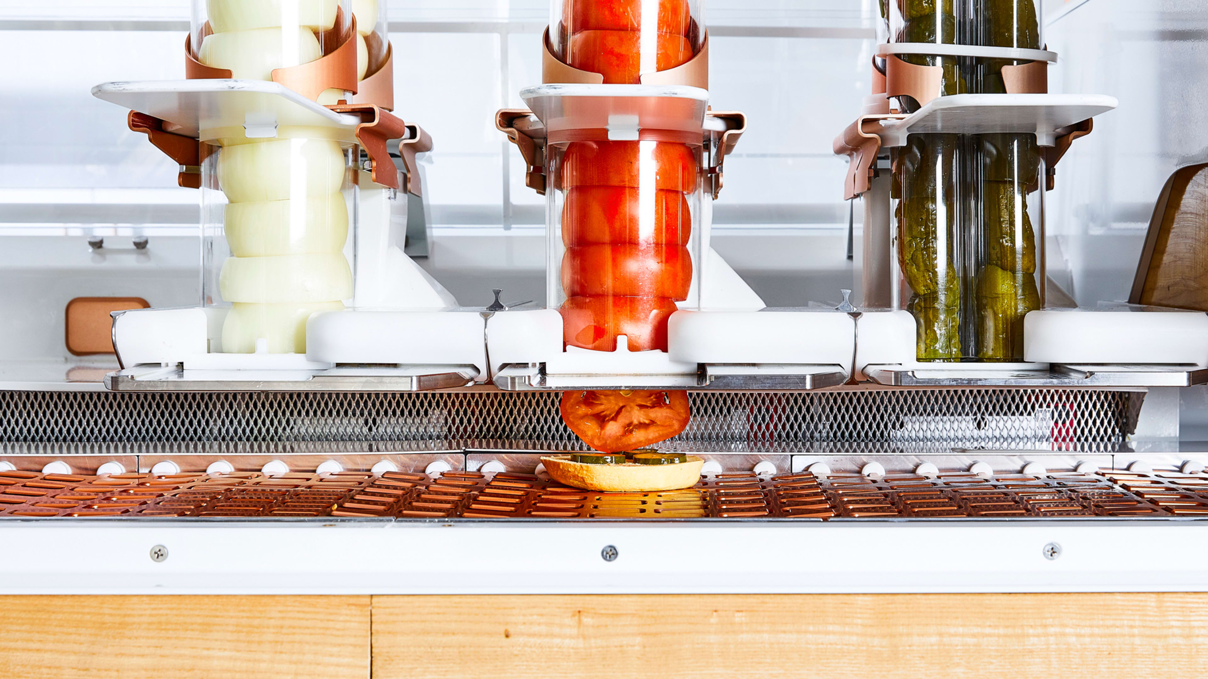 This crazy-looking robot is the chef at a new burger joint