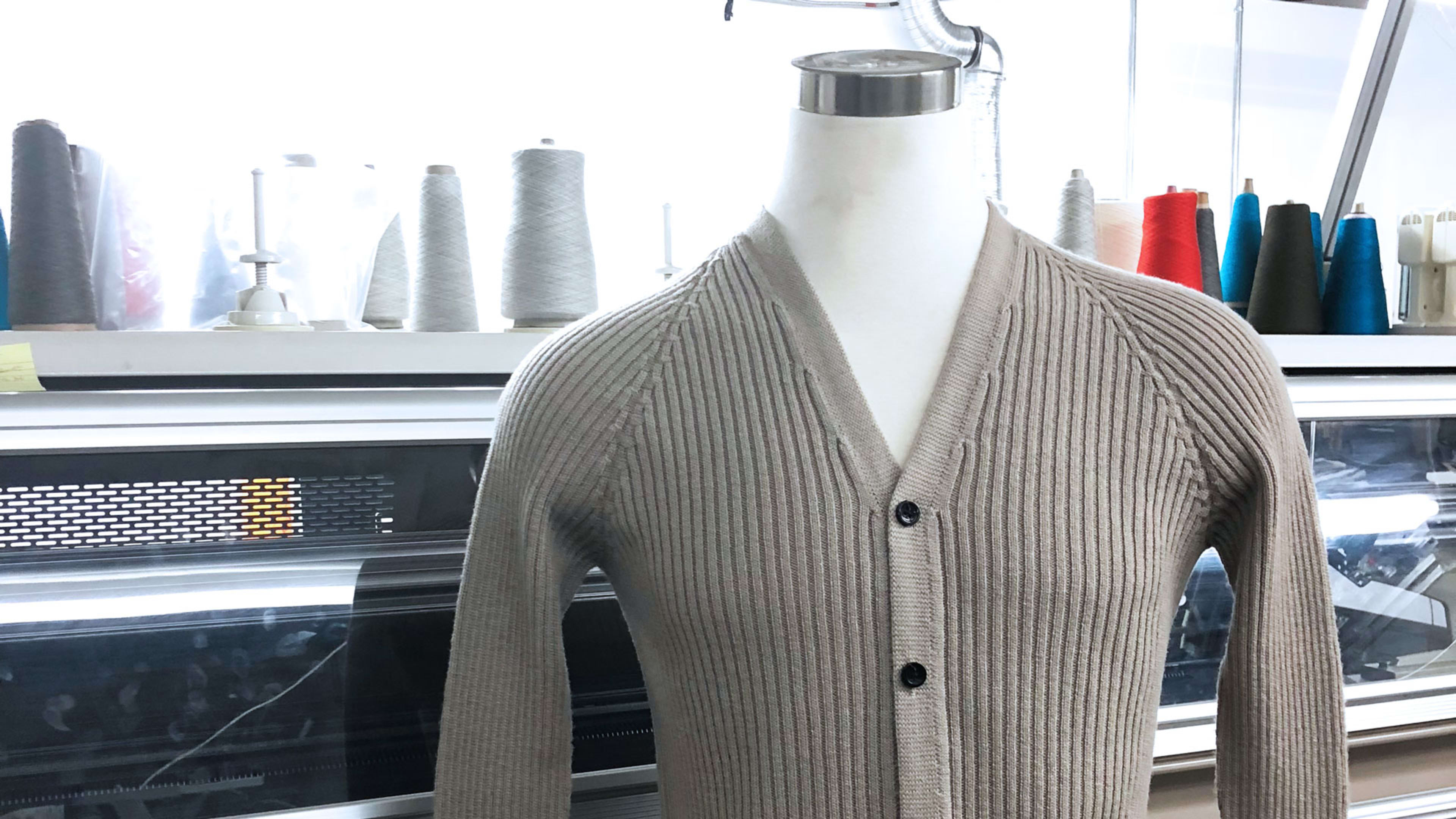 This clothing factory cuts waste by machine-knitting sweaters on demand