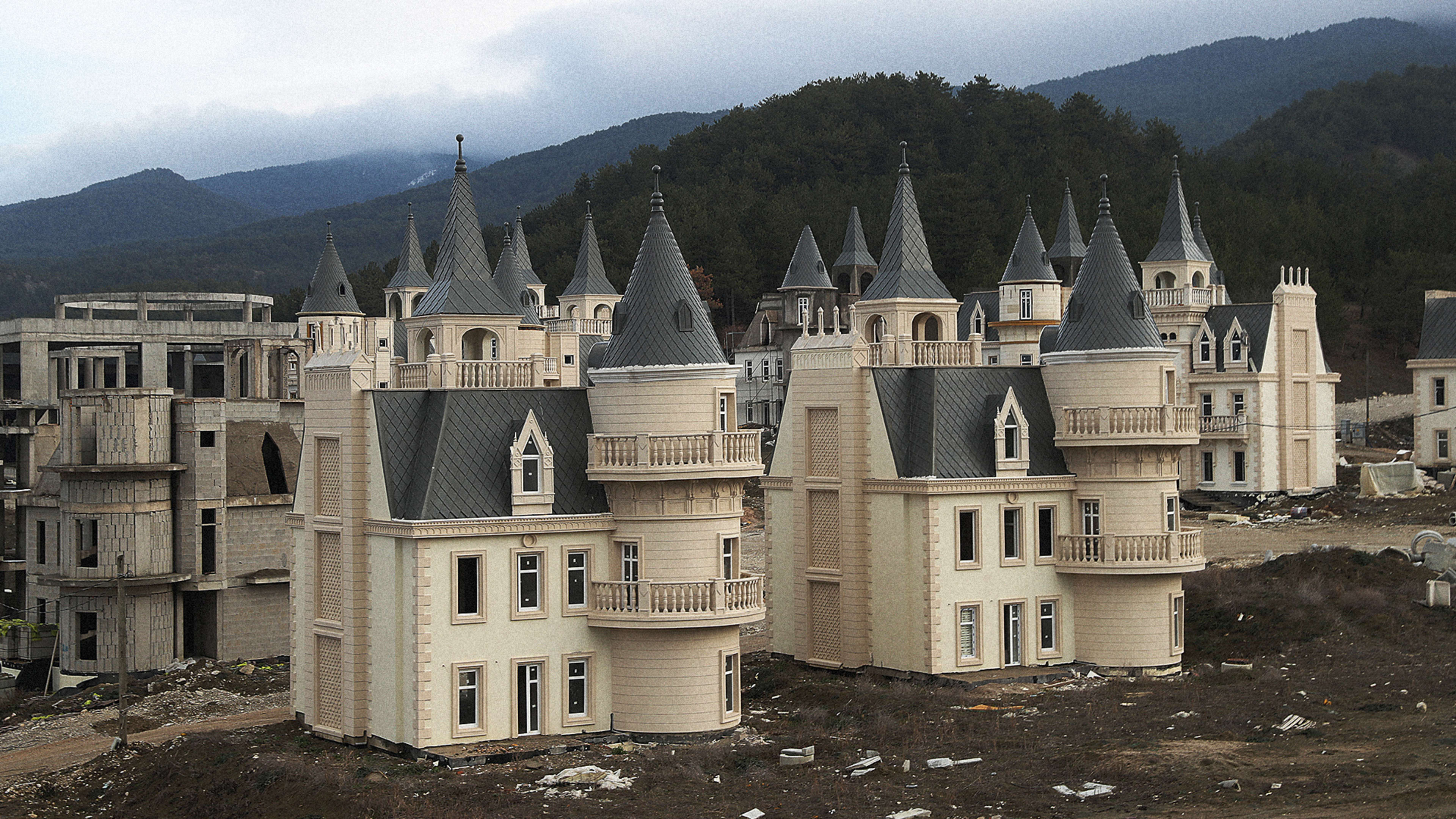 See an eerie ghost town of castles, created by Turkey’s recession