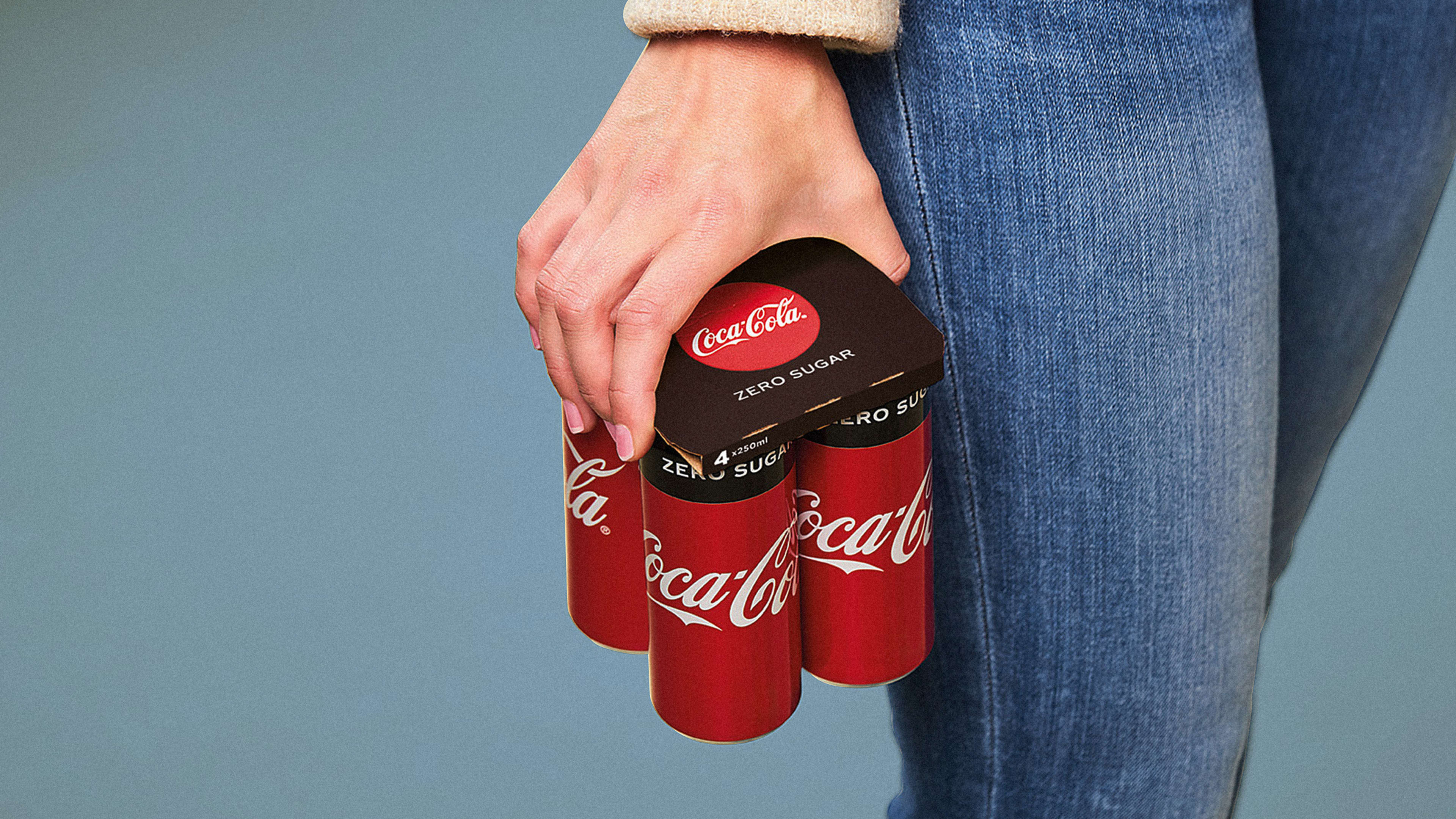 These new Coke and Bud packages ditch plastic six-pack rings for cardboard carriers