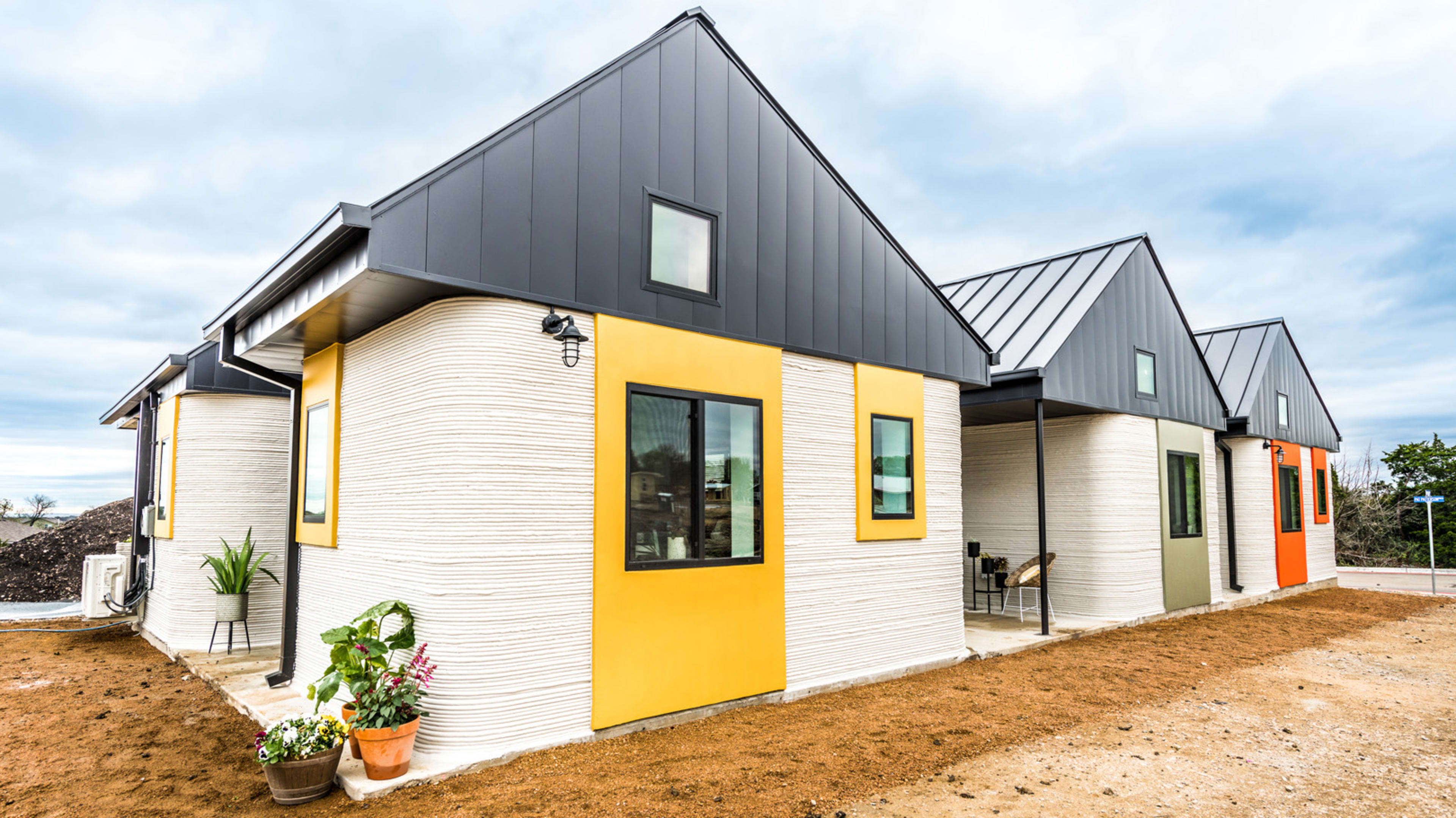 This village for the homeless just got a new addition: 3D-printed houses