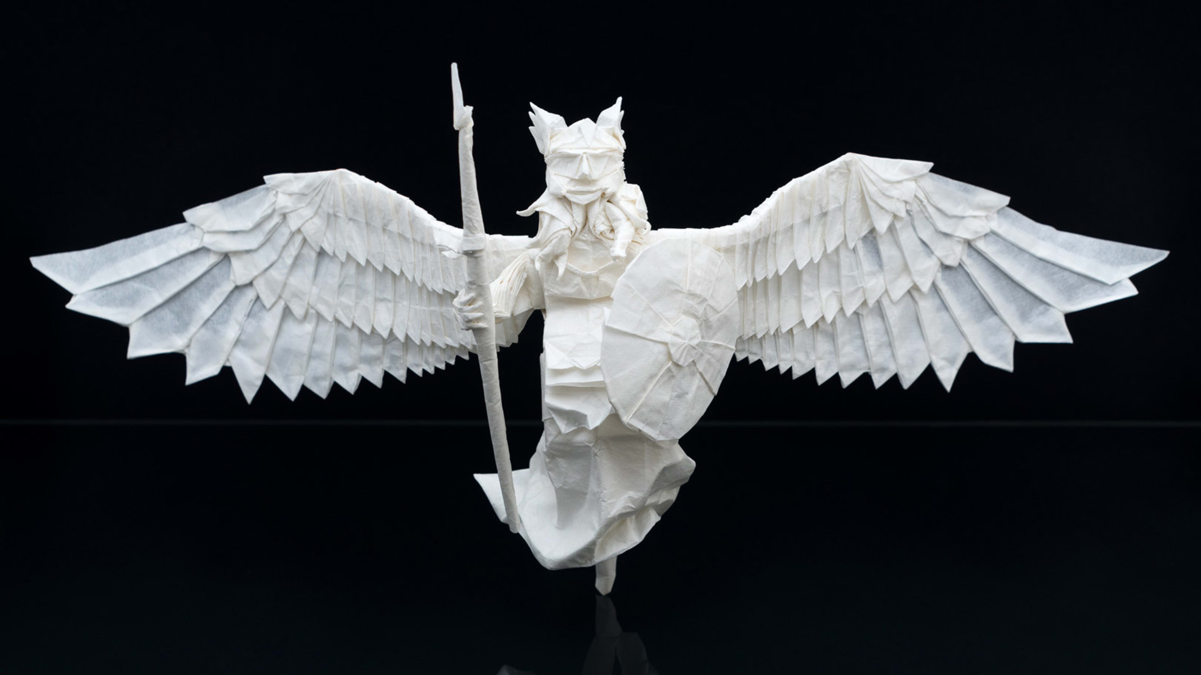 These impossibly detailed origami figures are made of a single piece of paper