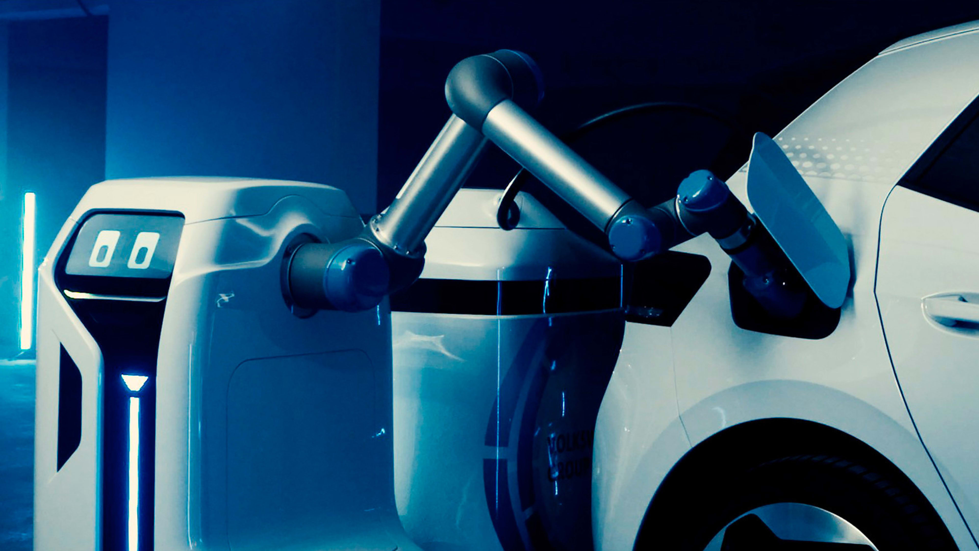 This helpful little Volkswagen robot will roll up and charge your electric car