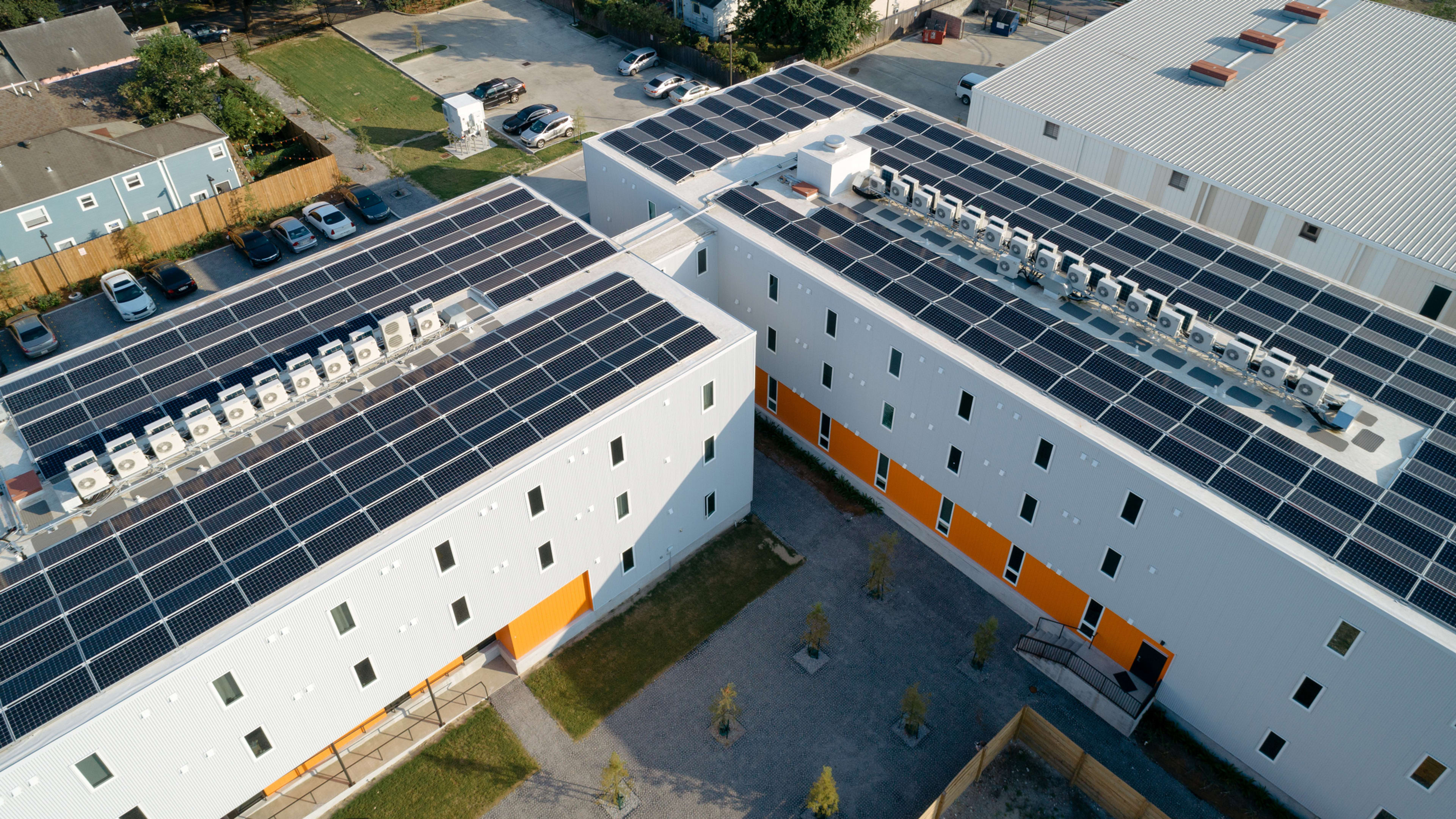 In New Orleans, a solar microgrid is keeping lights on in this affordable apartment building