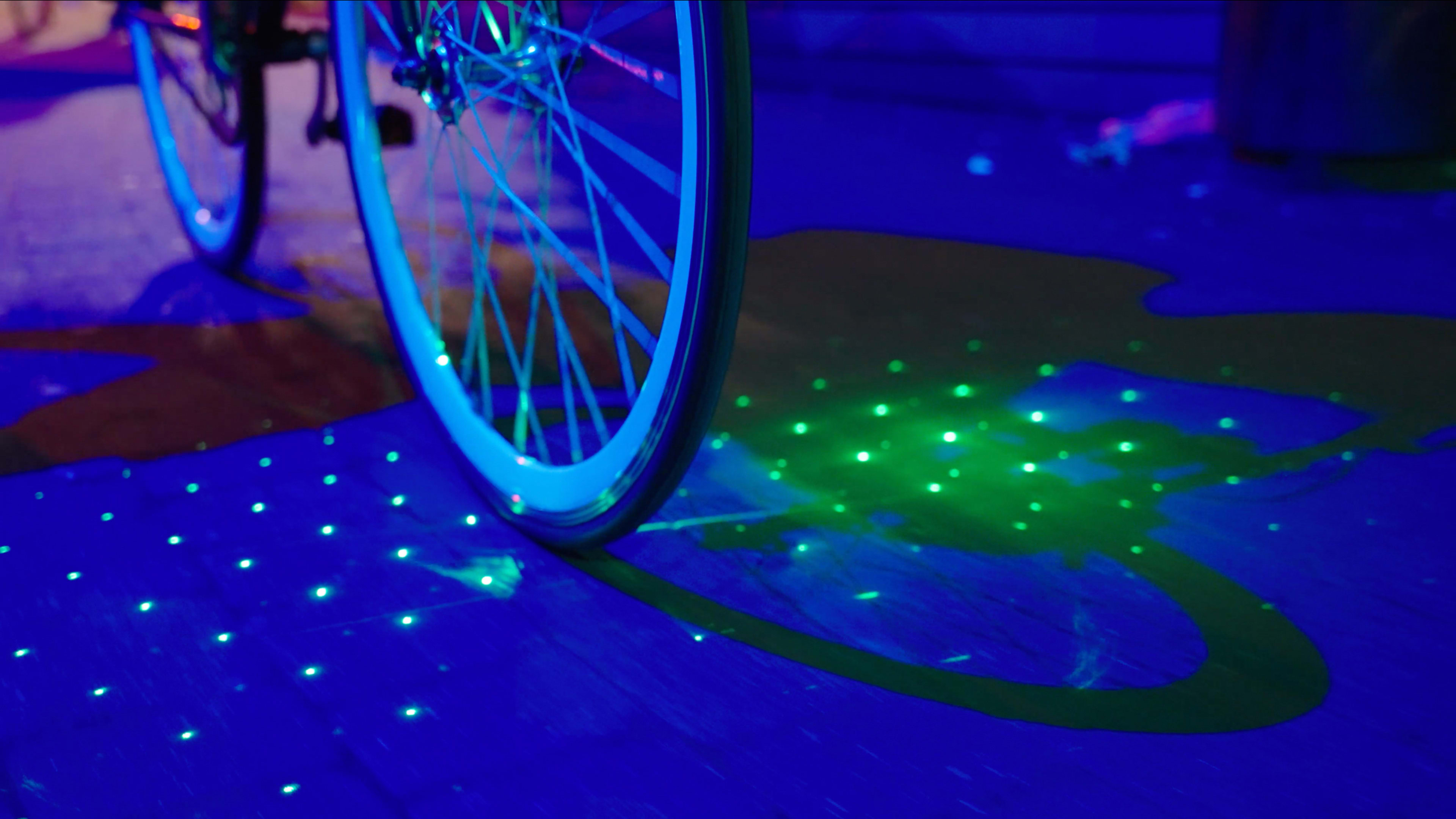 This light projects a buffer zone around your bike—and maps the safest roads