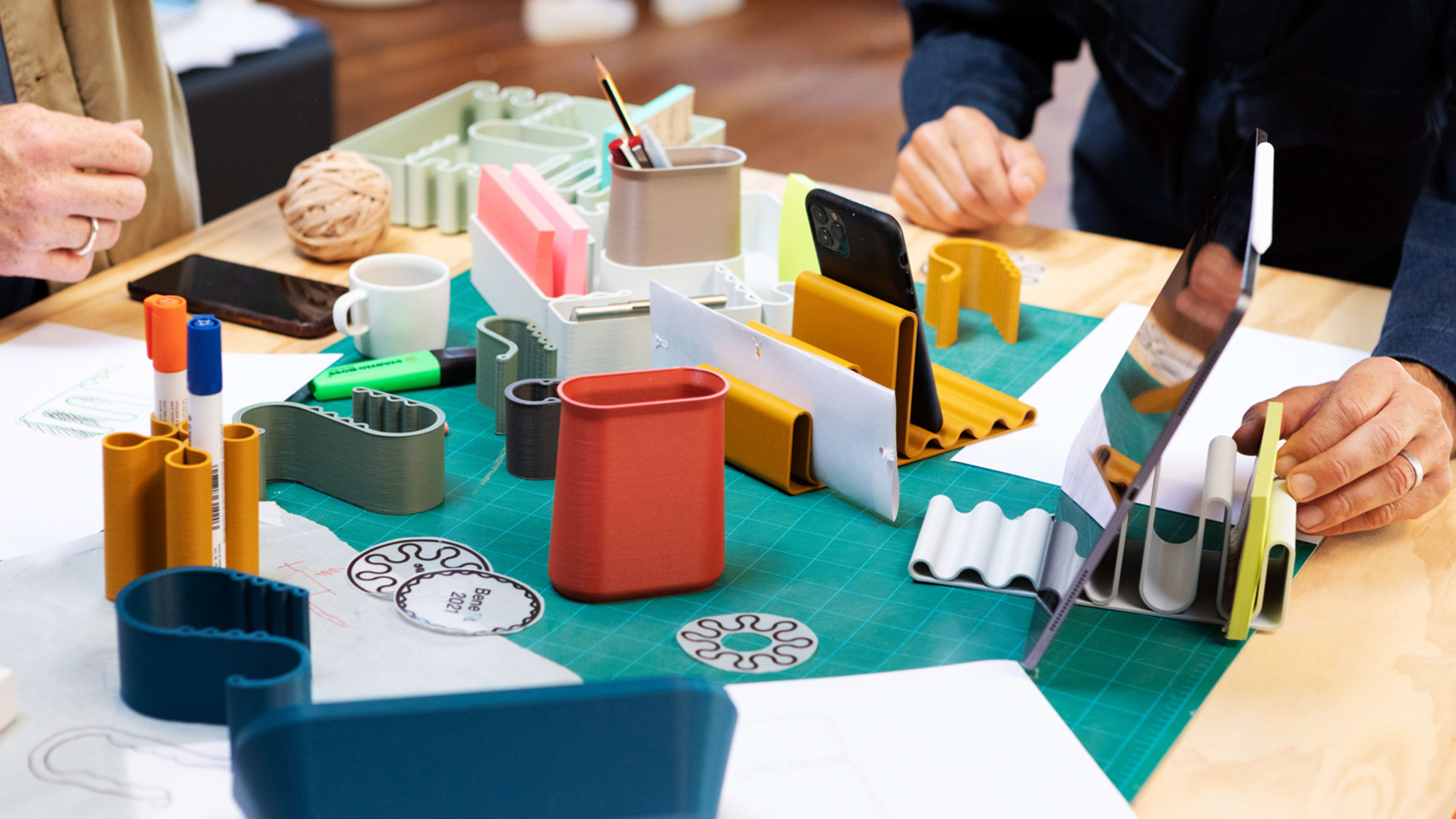 These playful desk accessories were 3D-printed using recycled food packaging