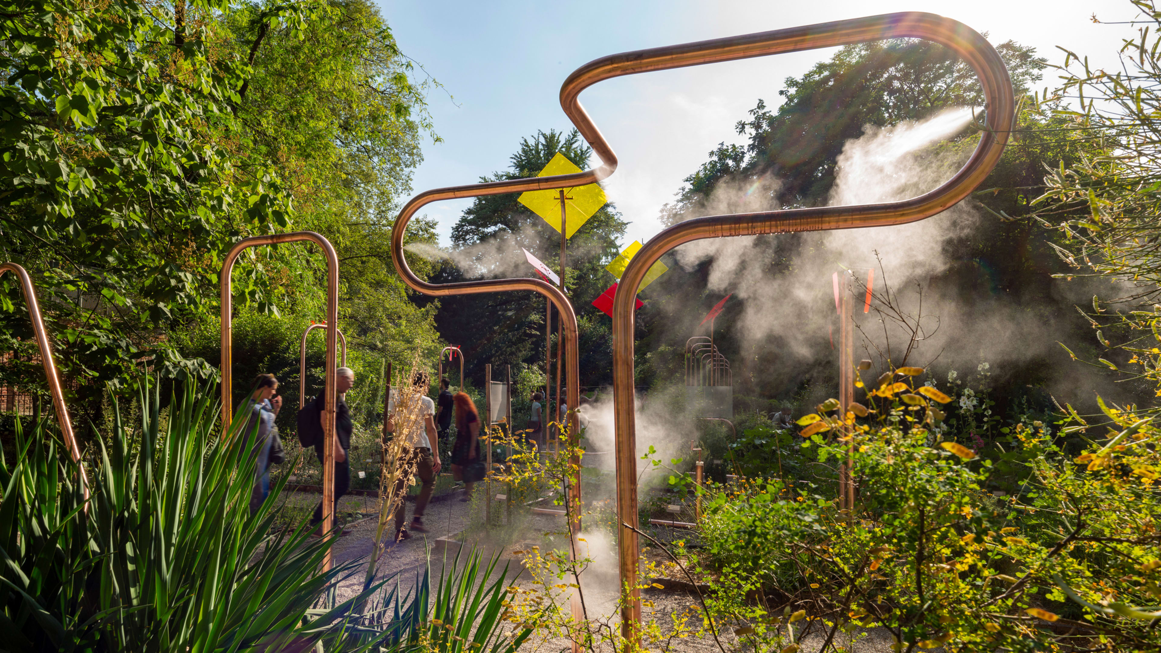This stunning garden uses playground equipment and copper tubes to water itself