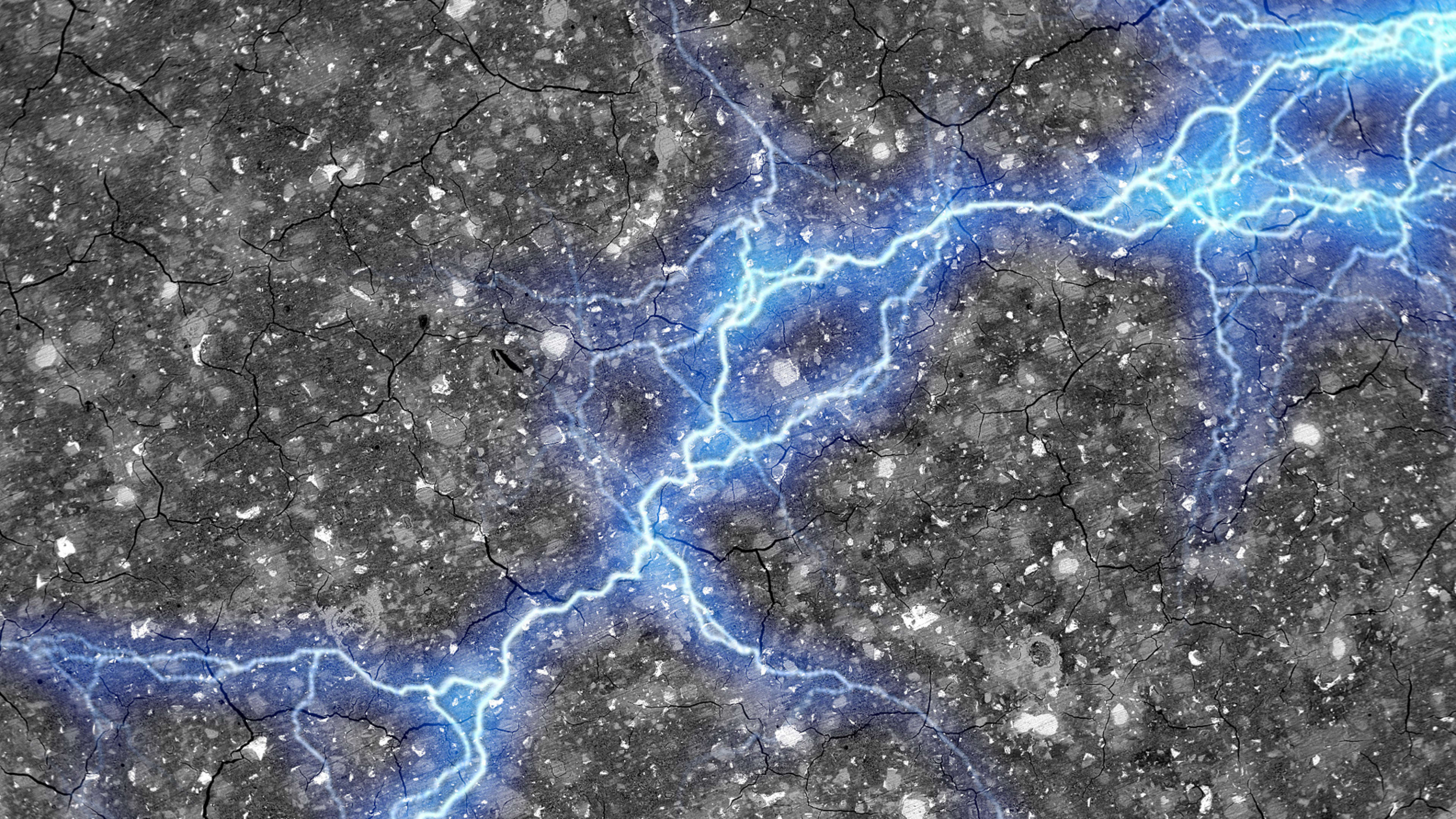 A streak of blue lightning, representing energy, spreads horizontally across a textured cement surface.