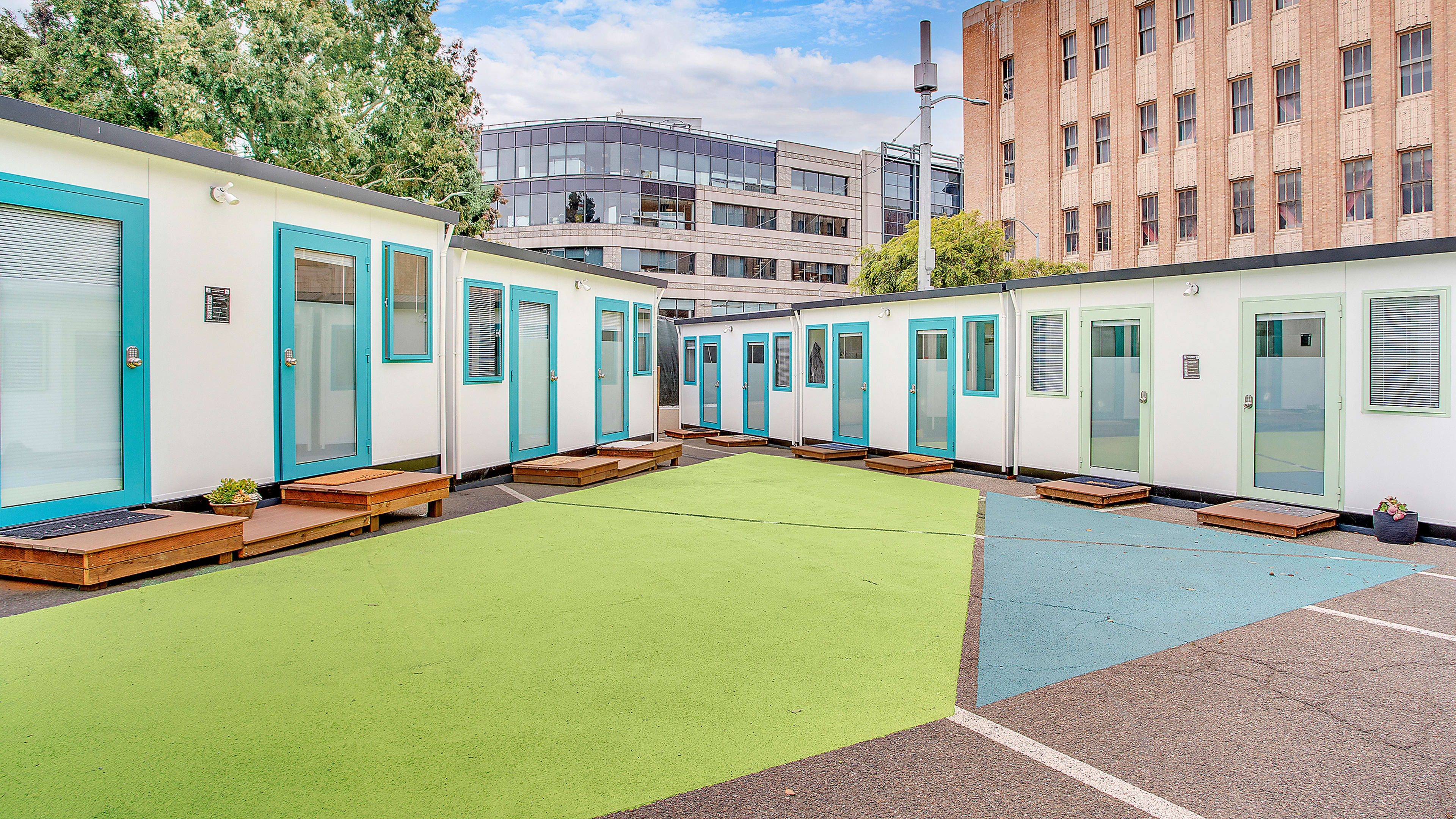 Why these cities may trade parking lots for tiny houses