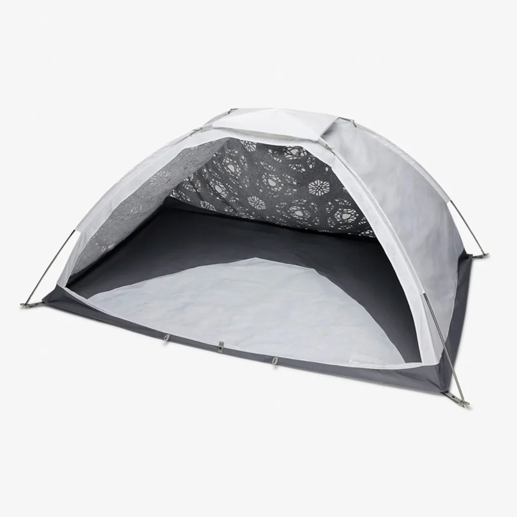 The Nike ISPA Metamorph poncho unfolded as a tent.