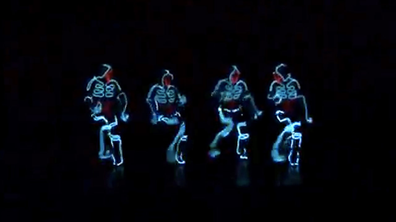 Wrecking Crew Orchestra Defies Dance Physics With Tron Suits Fast