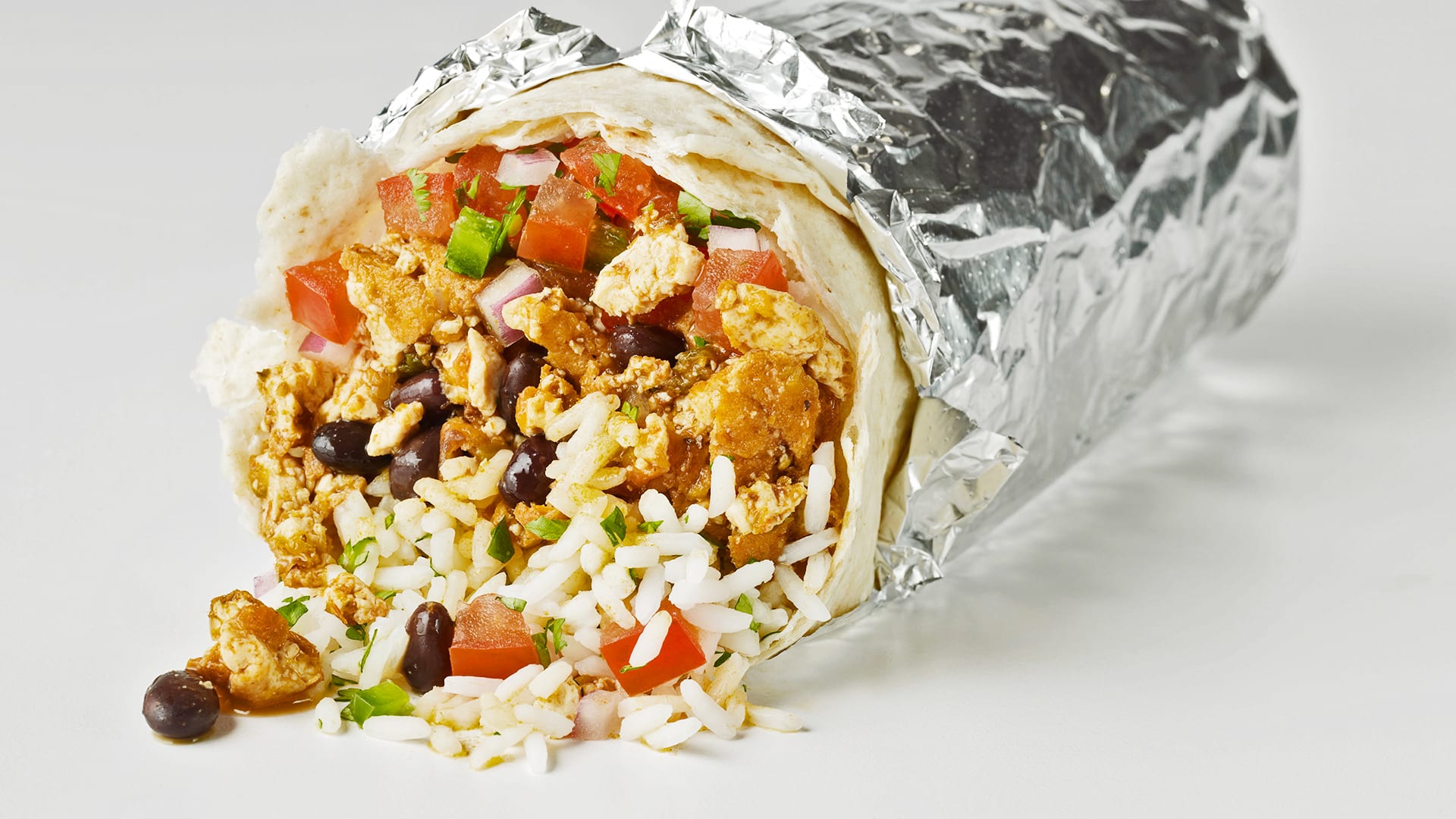 Chipotle's First-Ever New Menu Item, The Vegan Tofu Burrito, Goes National  - Fast Company, image size:1920x1080
