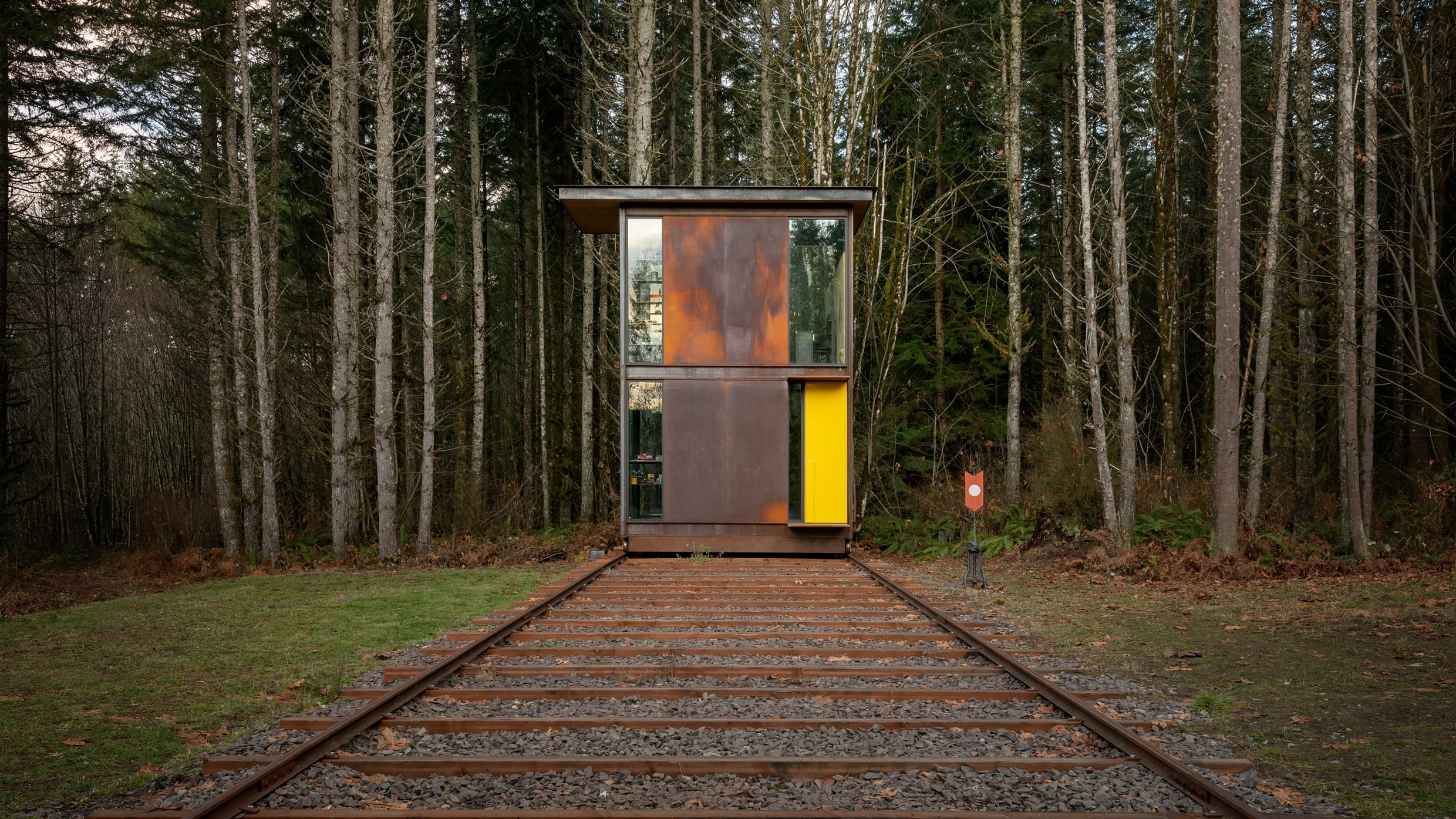 Olson Kundig designed a home office to roll on railroad tracks