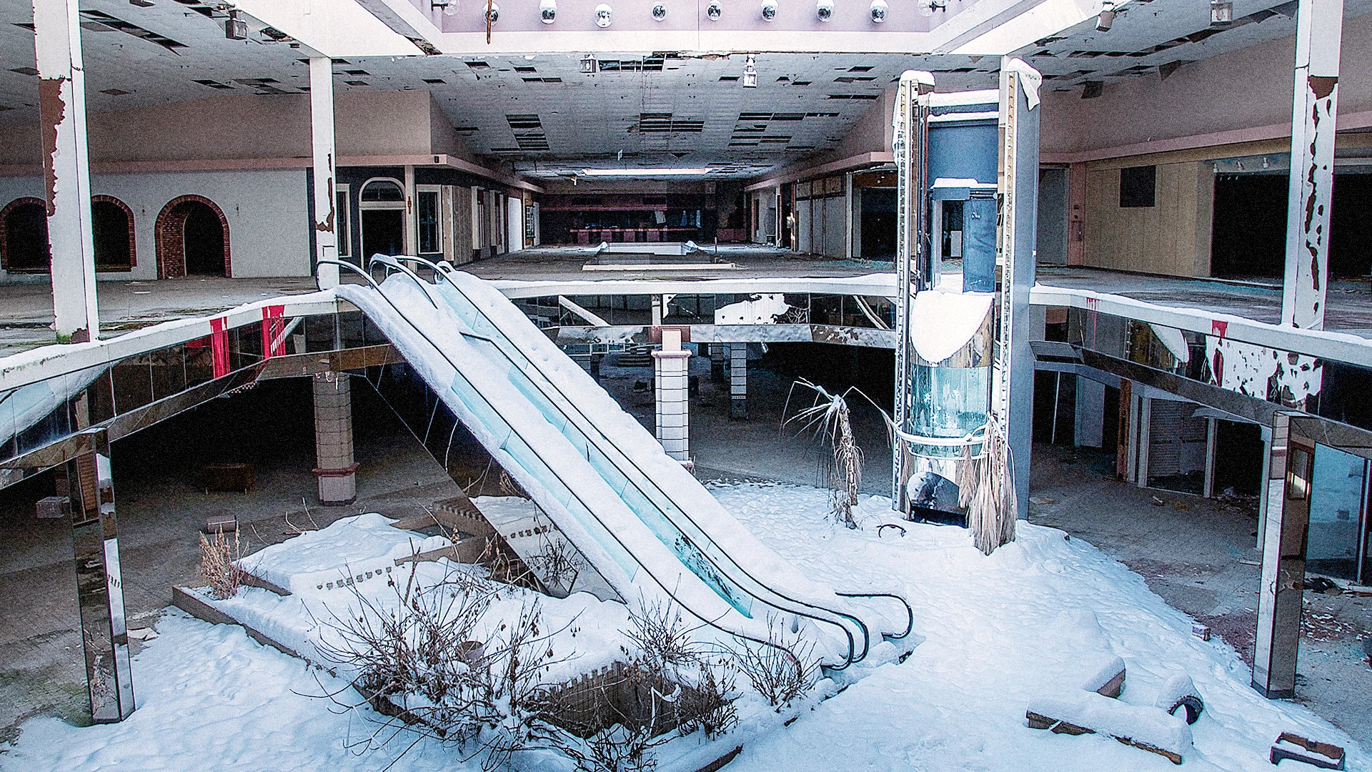 Surreal Photos Of Abandoned, Snow-Filled  Malls Show The Death Of An Era In America