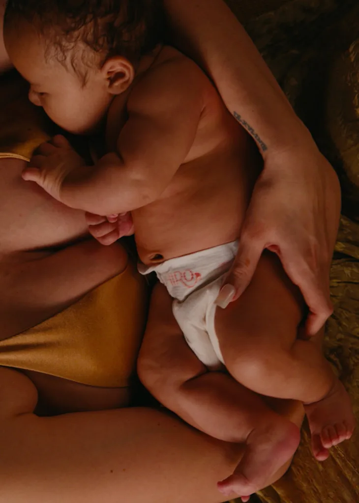A baby wearing a Hiro diaper.