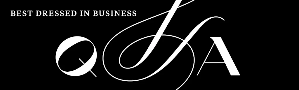 A black and white image with text that reads "Best Dressed In Business"