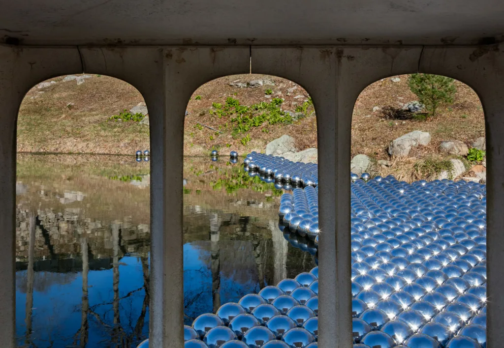 Thousands Of Mirrored Orbs Descend Upon The Glass House - Fast Company Thousands Of Mirrored Orbs Descend Upon The Glass House - Fast Company
