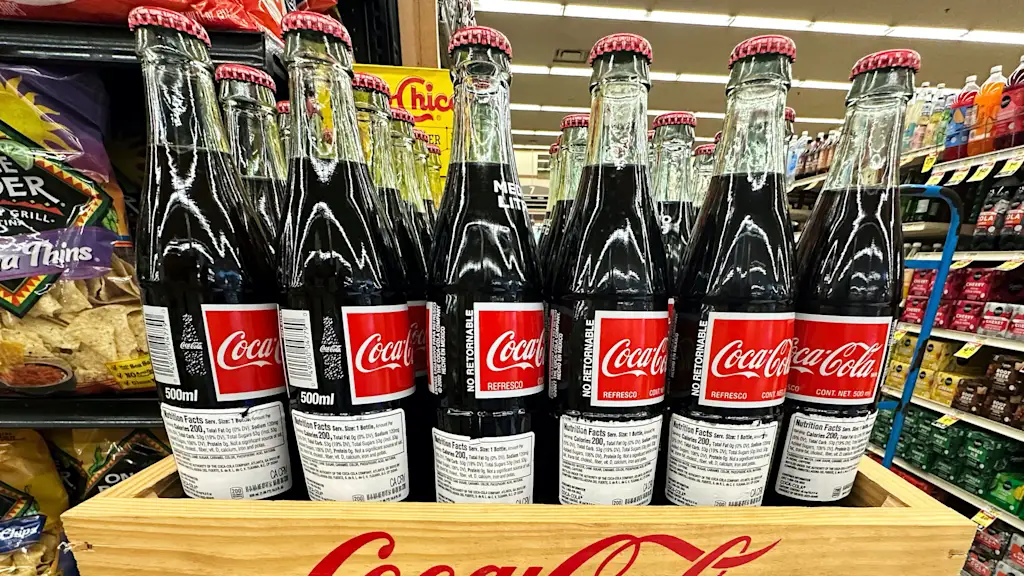 Coca-Cola third quarter results rise with help from mini cans and premium drinks