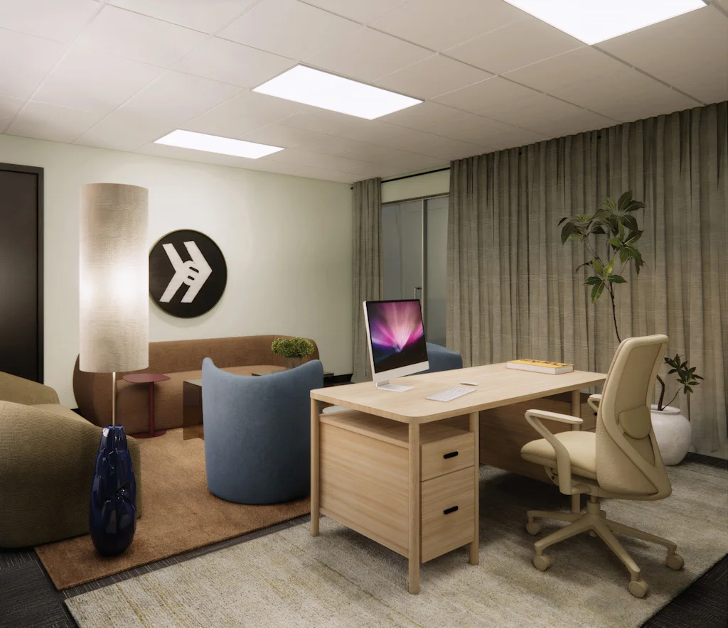 an office interior rendering with modern comfortable-looking furniture