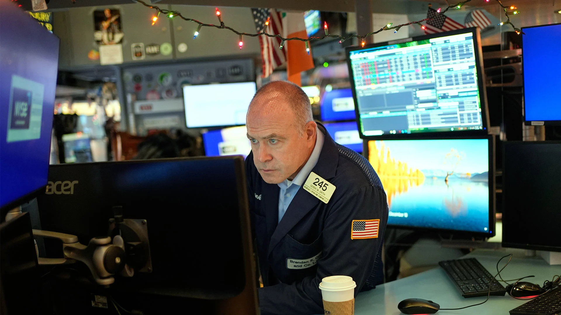 Markets hover near record levels as Wall Street prepares to close early for Christmas holiday