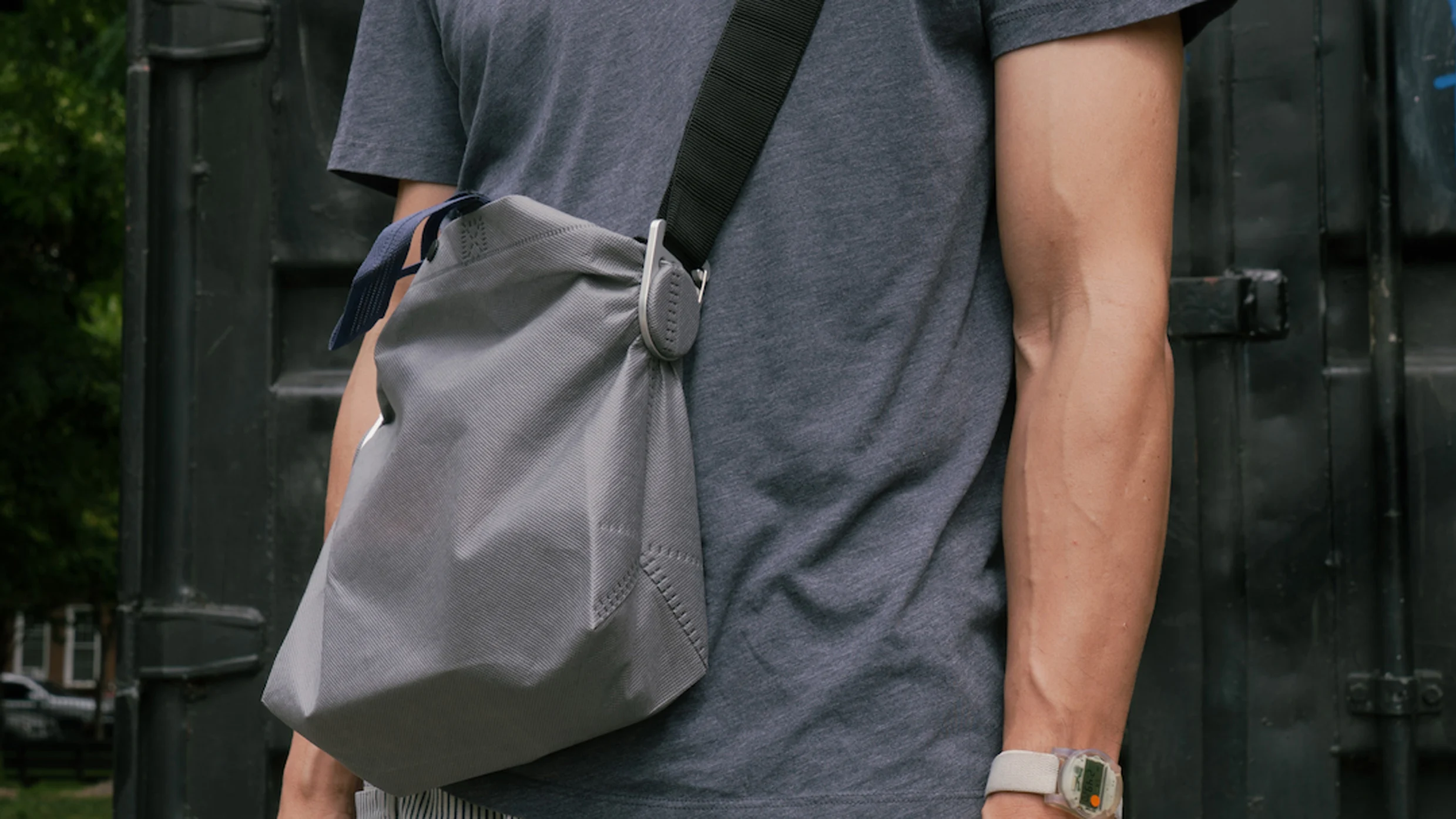 This genius clamp instantly transforms your tote into a crossbody bag