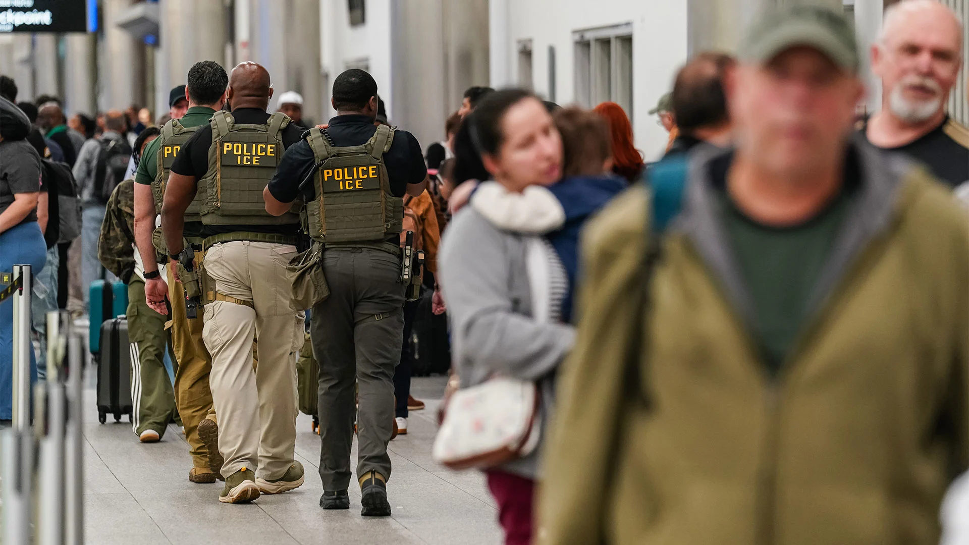 'Another disaster waiting to happen': Sending ICE agents into airports incites uproar as TSA wait times stretch hours long