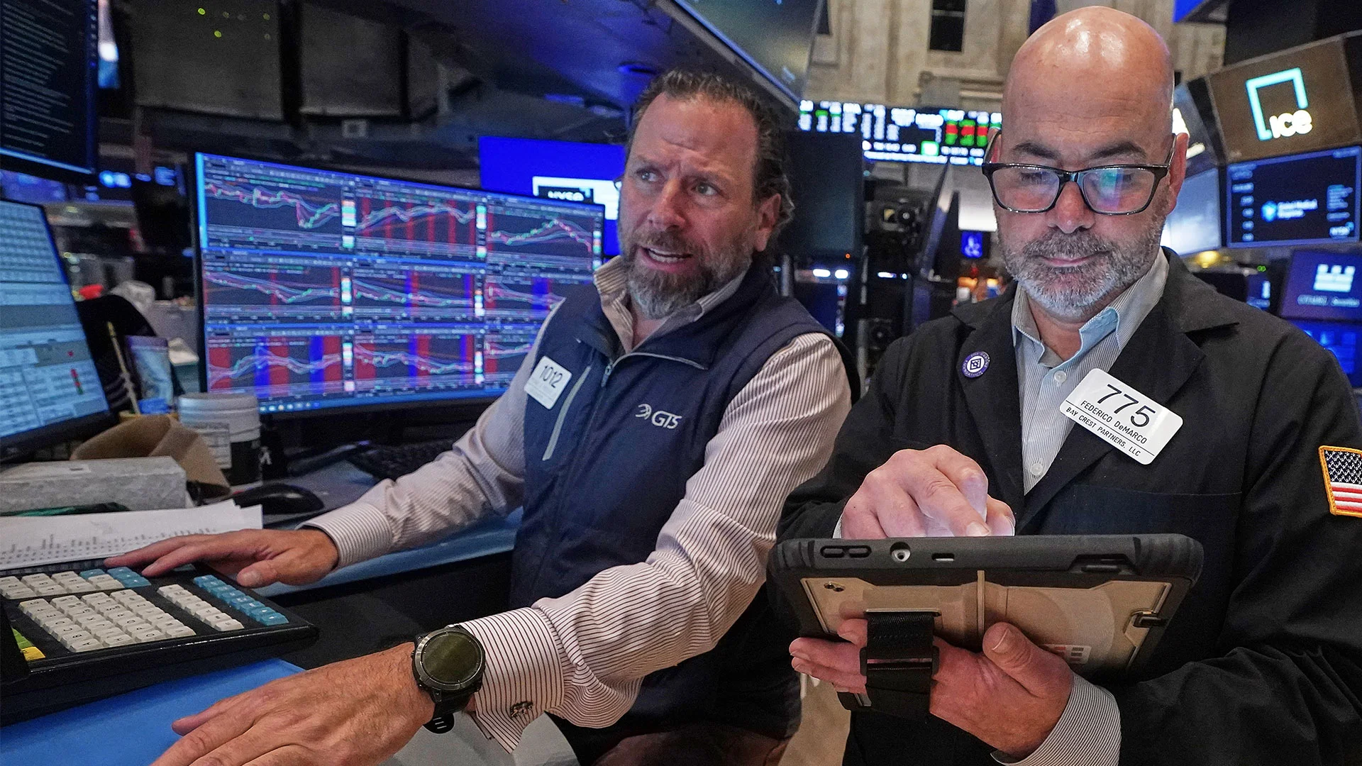 U.S. stocks slide from records as bond market rattles under pressure