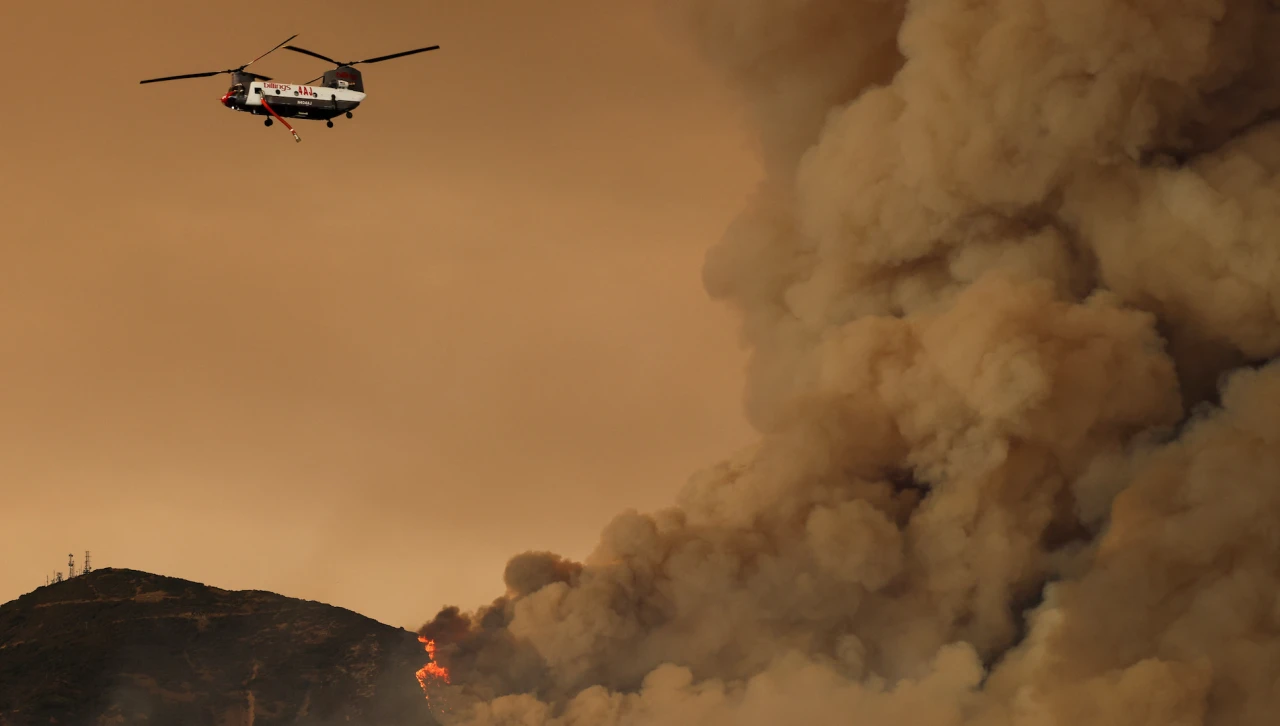 Southern California wildfires burn homes and ski resort, forcing evacuations