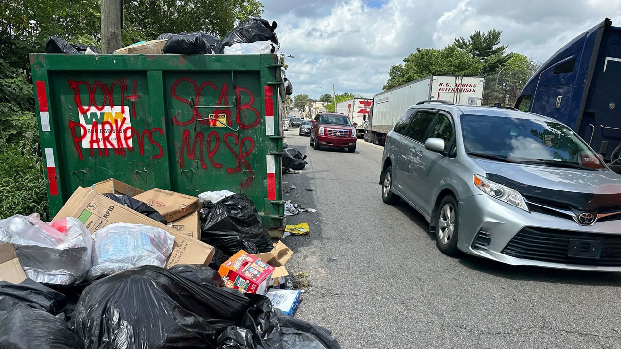 Philadelphia strikes a tentative deal with union over a stoppage that caused a backlog of trash