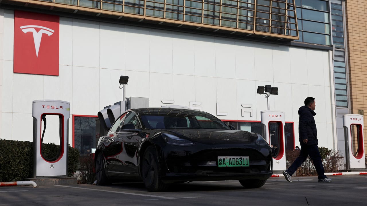 Tesla’s EV charging team layoffs could slow down Biden’s NEVI rollout, here’s why