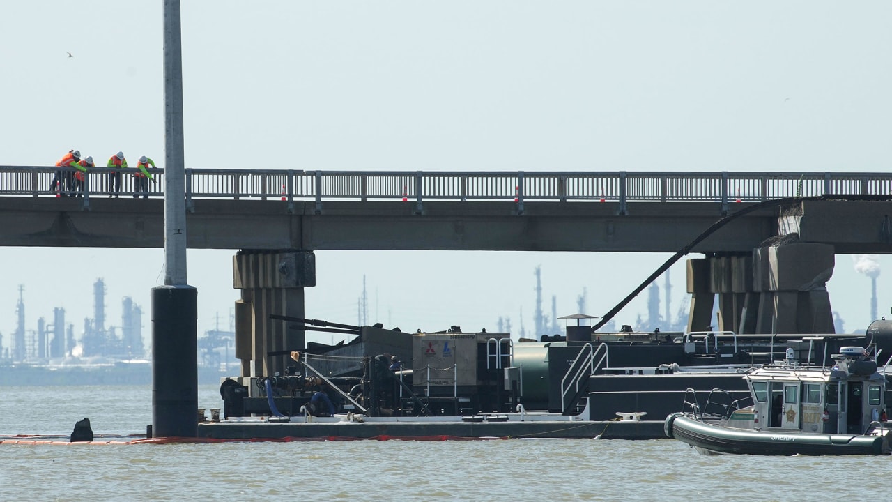 Oil spill and partial bridge collapse happen after a barge collides at Texas port 