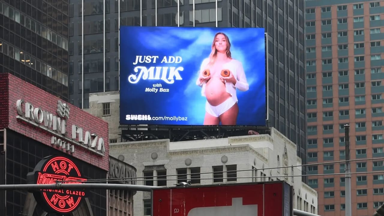 This Times Square breastfeeding ad for lactation cookies was taken down, sparking a social media debate