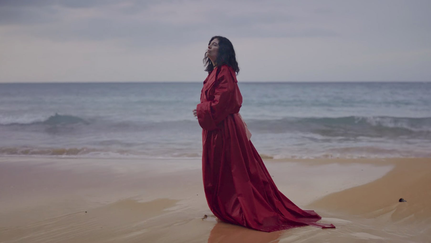 lorde red dress Lorde Wore One of Jenny Holzer's Inflammatory Essays on the Back of Her Grammys Dress In Protest