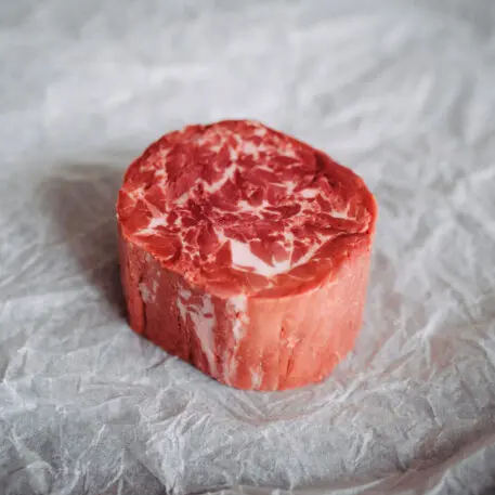 A photo of the alternative meat product, the marbling looks nearly identical to a beef product. 