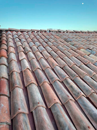 These 'terra-cotta' tiles blend in perfectly with Italian roofs. But ...