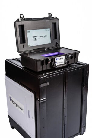 Voting machines are costly and black-boxed. Some towns are trying ...