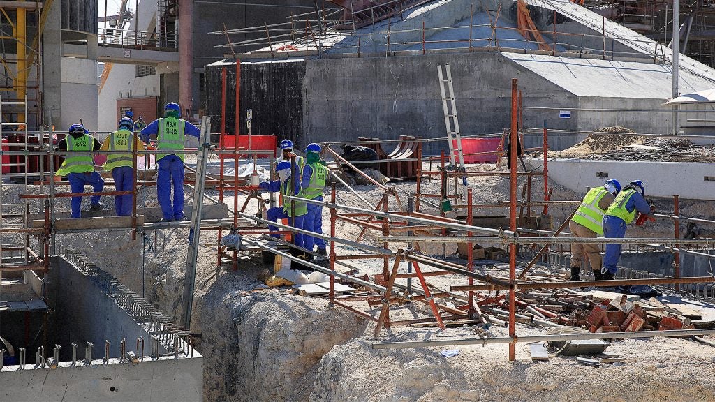 How Migrant Workers Literally Pay To Build Architecture - Fast Company