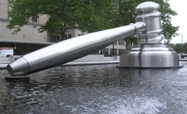 gavel in water sculpture
