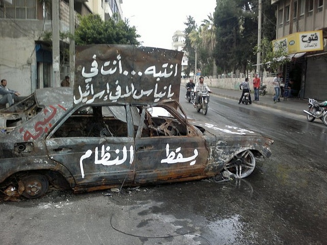 burnt car in Syria